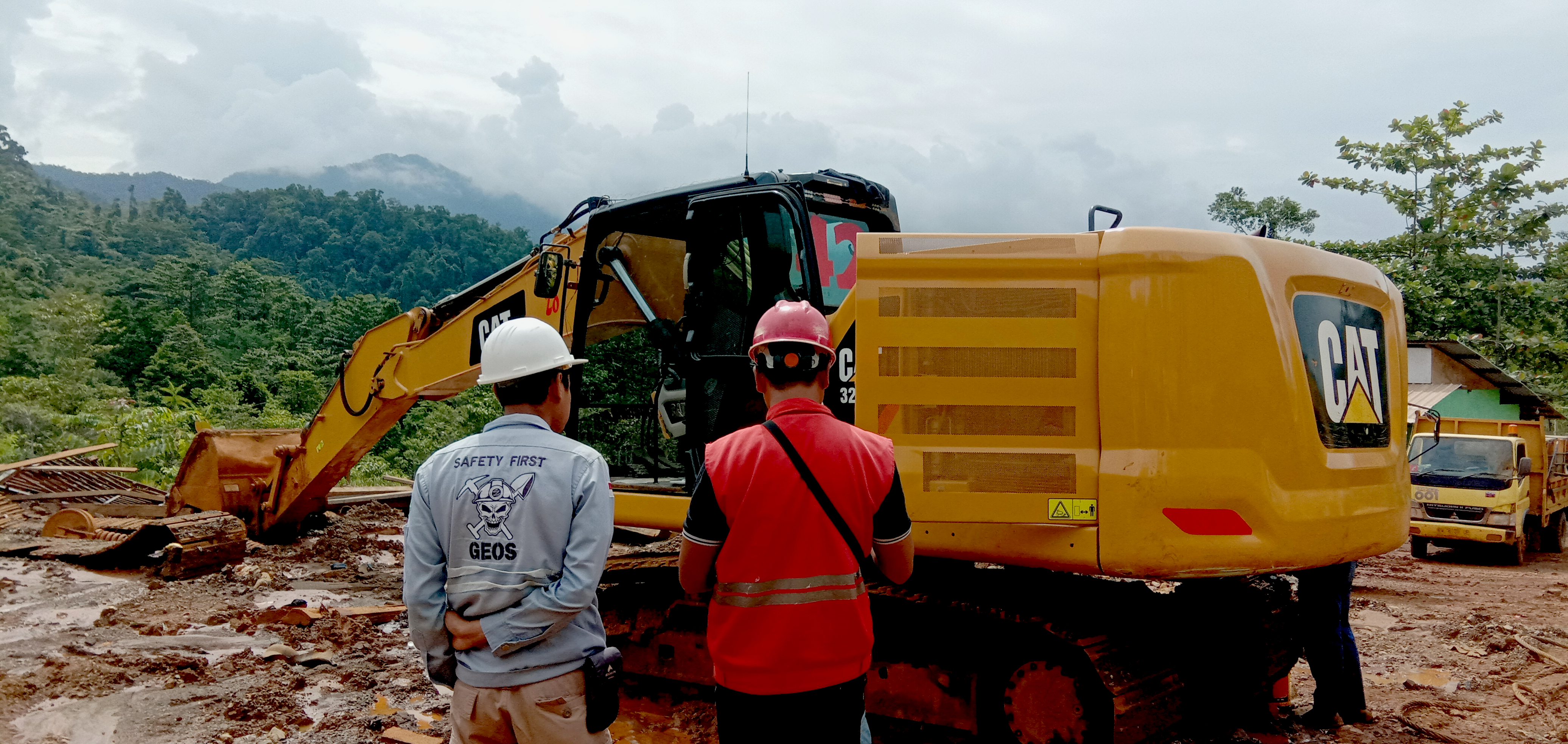 Yellow motor grader in construction